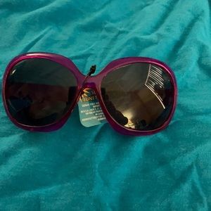 Purple wide rimmed sun glasses